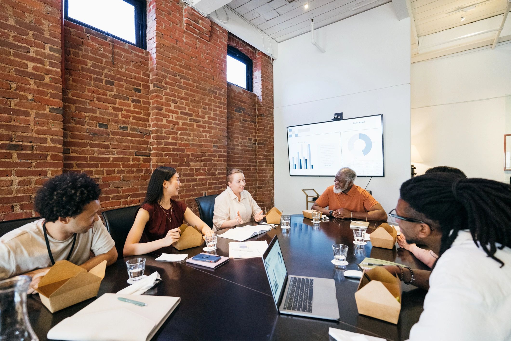 Editorial team collaborating in a meeting