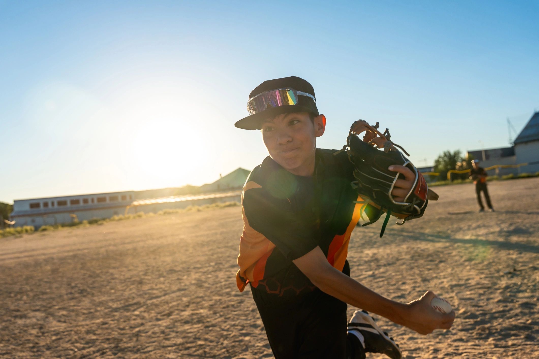 Baseball pitcher throwing during practice
