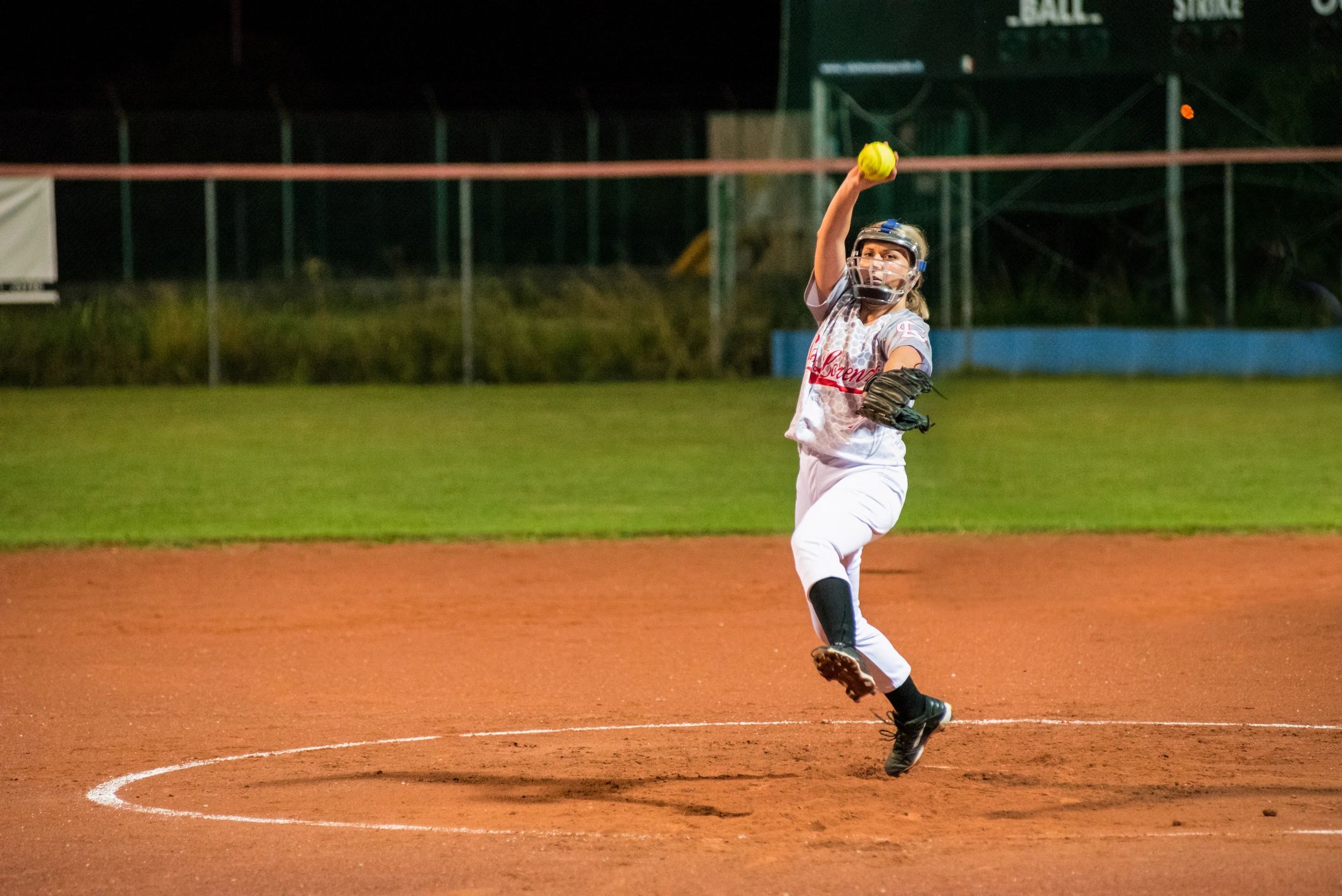 Softball pitcher throwing the ball